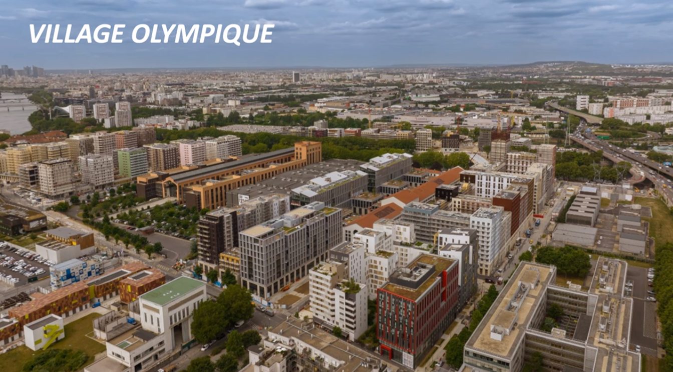 Village olympique et paralympique Paris 2024 : mission Manager Delivery Village, FedeA Vue aérienne du village olympique et paralympique de Paris 2024, entre Saint-Denis, Saint-Ouen et L'Île-Saint-Denis